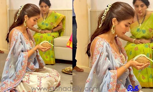 చేతిలో కొబ్బరికాయ, నెత్తిలో మల్లెపూలు: పూజ ఏ పూజ చేస్తోంది!