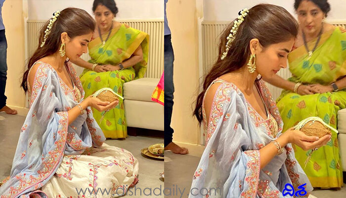 చేతిలో కొబ్బరికాయ, నెత్తిలో మల్లెపూలు: పూజ ఏ పూజ చేస్తోంది! చేతిలో కొబ్బరికాయ, నెత్తిలో మల్లెపూలు: పూజ ఏ పూజ చేస్తోంది!