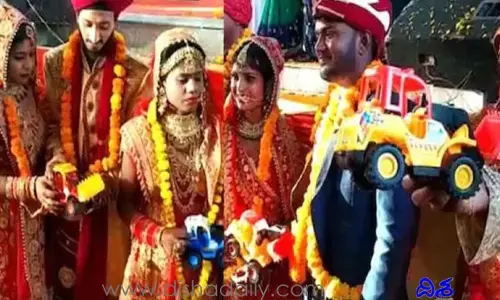 అక్క‌డ పెళ్లిచేసుకున్నోళ్ల‌కి బుల్డోజ‌ర్ గిఫ్ట్‌..! ఎందుకో తెలుసా?