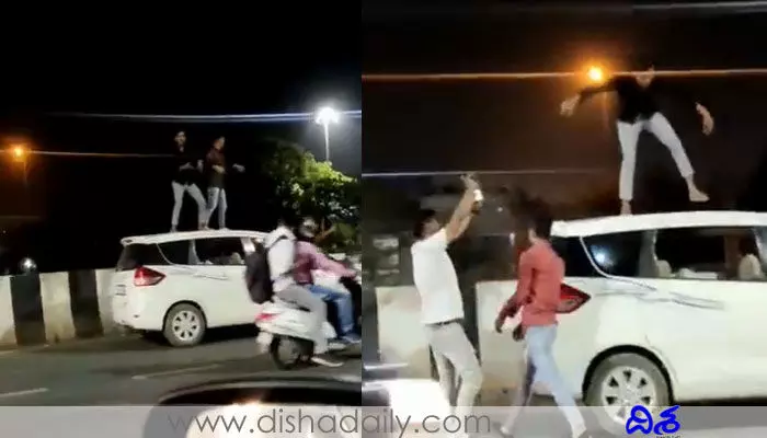 ఫుల్లుగా తాగి నడుస్తున్న కారుపై డ్యాన్స్.. రూ. 20 వేల ఫైన్ (వీడియో) ఫుల్లుగా తాగి నడుస్తున్న కారుపై డ్యాన్స్.. రూ. 20 వేల ఫైన్ (వీడియో)