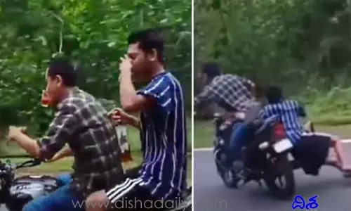 మ‌ద్యం తాగుతూనే బైక్ డ్రైవింగ్‌.. చివ‌రకు ఇలా ప‌డి ..?! (వీడియో)