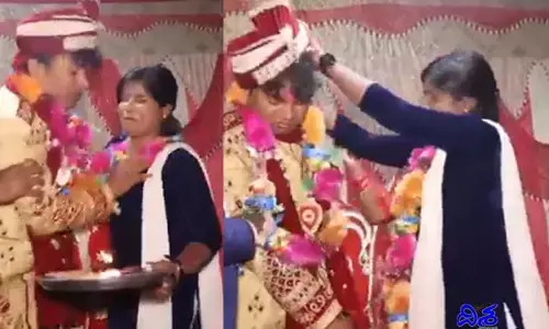 వేదిక పైనే వధువు ముందే వరుడిని పొట్టుపొట్టు కొట్టిన యువతి(వీడియో)