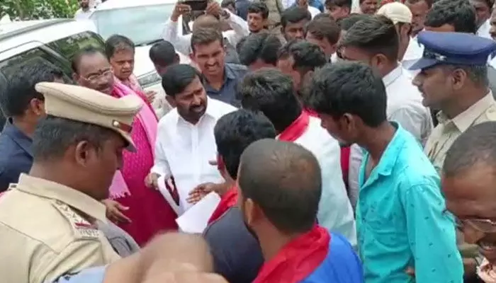 Villagers demanded minister Jagadish Reddy to fulfill the promises he has given Villagers demanded minister Jagadish Reddy to fulfill the promises he has given