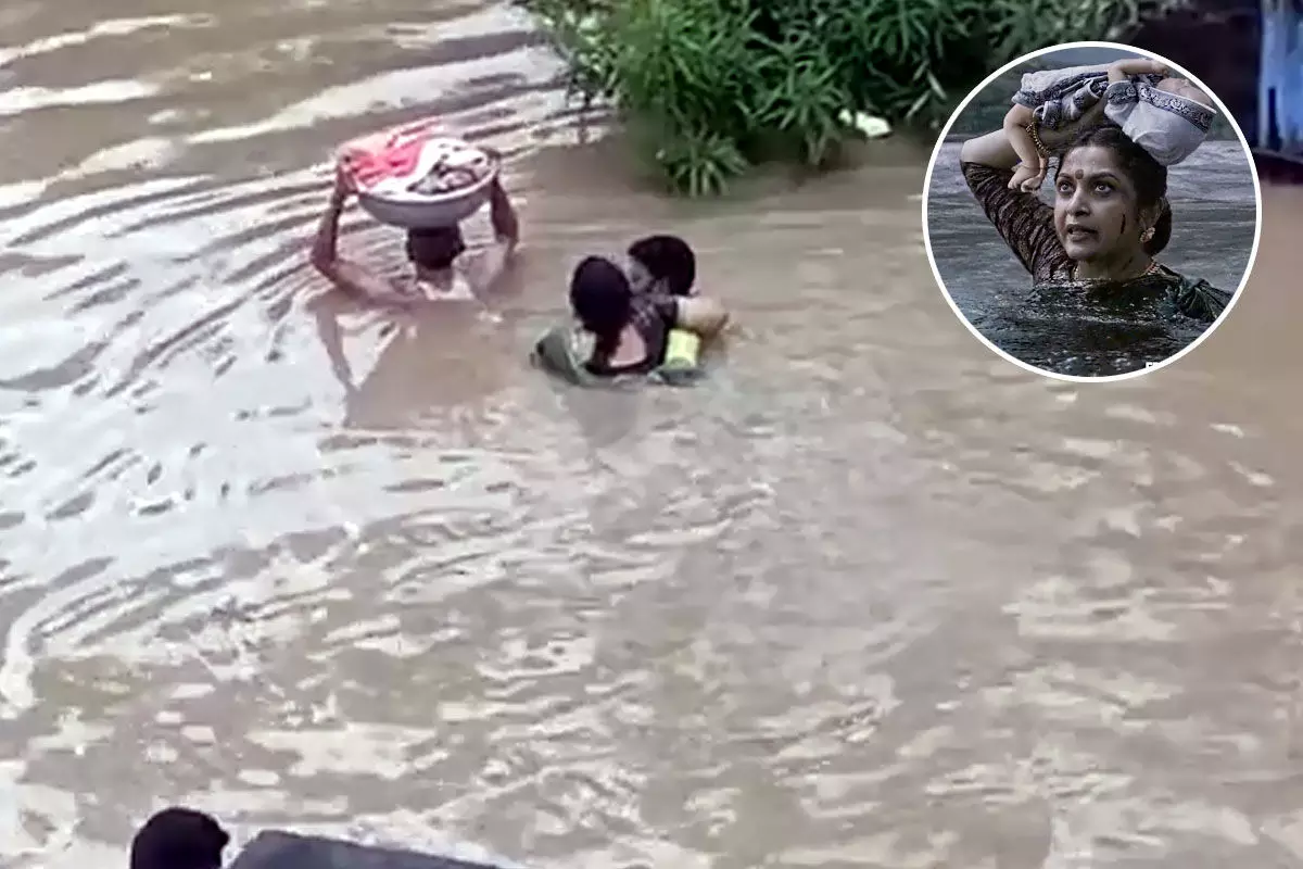 వరద బీభత్సం.. మర్రివాడలో బాహుబలి సీన్ (వీడియో) వరద బీభత్సం.. మర్రివాడలో బాహుబలి సీన్ (వీడియో)