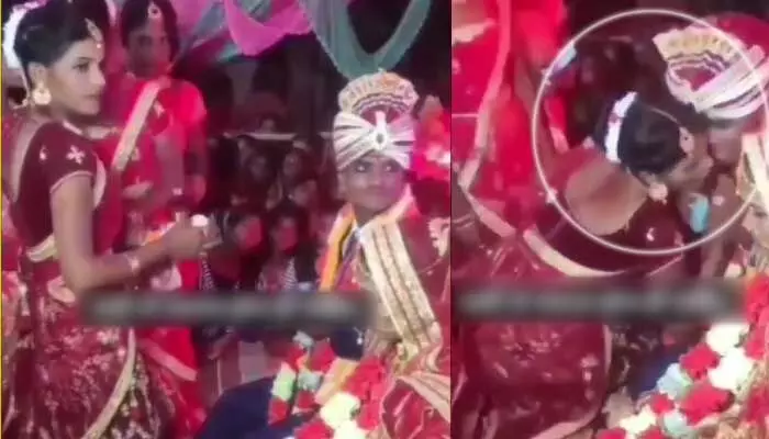 పెళ్లి వేదికపైనే వధువు చెల్లెలిని ముద్దు పెట్టుకున్న వరుడు....(వీడియో) పెళ్లి వేదికపైనే వధువు చెల్లెలిని ముద్దు పెట్టుకున్న వరుడు....(వీడియో)