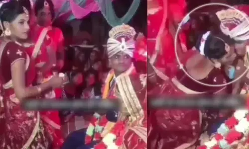 పెళ్లి వేదికపైనే వధువు చెల్లెలిని ముద్దు పెట్టుకున్న వరుడు....(వీడియో)