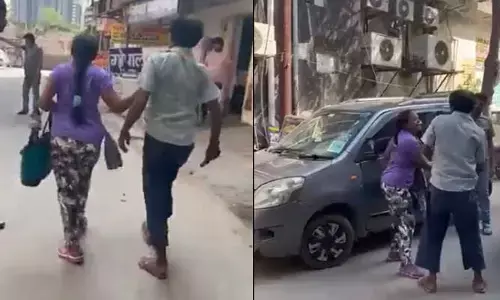 శివాలెత్తిన మహిళ... గల్లా పట్టి మరీ అతడిని లాక్కెళ్తూ...(వీడియో)