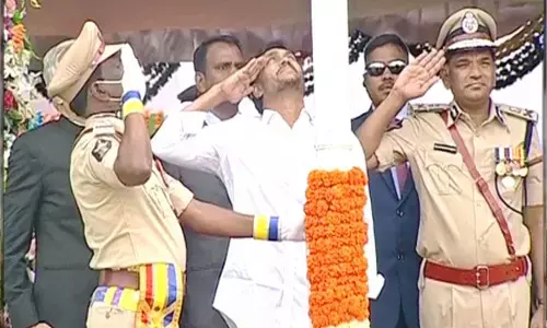 CM Jagan Unveils National Flag at Vijayawada Indira Gandhi Municipal Stadium