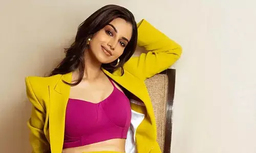 Meenakshi Chaudhary Stylish Look In Yellow Suit