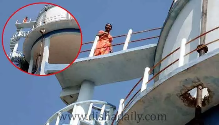 సర్పంచ్ వేధింపులు.. వాటర్ ట్యాంక్ ఎక్కిన మహిళ సర్పంచ్ వేధింపులు.. వాటర్ ట్యాంక్ ఎక్కిన మహిళ