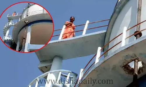 సర్పంచ్ వేధింపులు.. వాటర్ ట్యాంక్ ఎక్కిన మహిళ