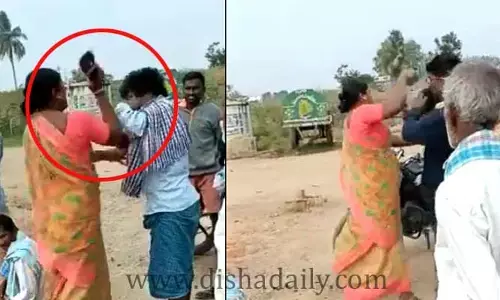 దళితుడిపై మహిళా సర్పంచ్ దాడి! (వీడియో)