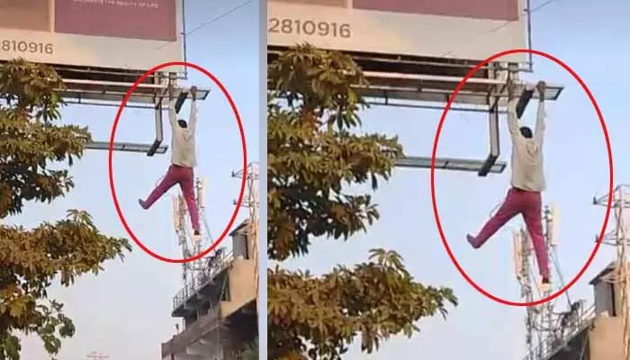 టీ హోర్డింగ్ ఎక్కి ఆత్మహత్యాయత్నం (వీడియో) టీ హోర్డింగ్ ఎక్కి ఆత్మహత్యాయత్నం (వీడియో)
