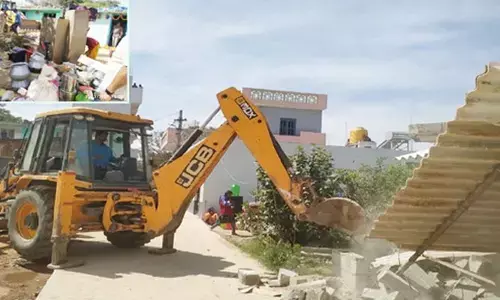 పేదల ఇల్లు కూల్చివేత.. అడ్డుకున్న బాధితుల అరెస్ట్