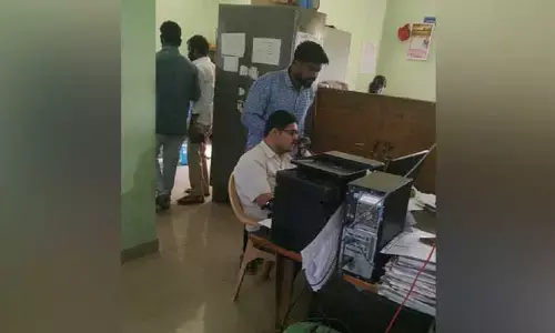 అధికారుల అండతోనే యువకుడి అత్యుత్సాహం..