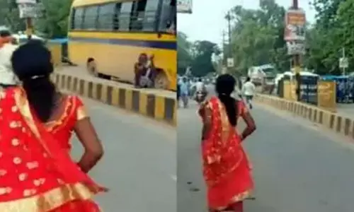 భర్తను కొట్టి నడిరోడ్డుపై భార్య వస్త్రాలు చింపేసిన దుర్మార్గులు