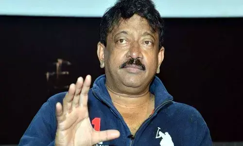 5 వేల వీధి కుక్కలను ఆమె ఇంట్లో వదలి తాళం వేయండి: Ram Gopal Varma
