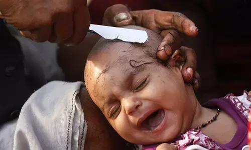 చిన్న పిల్లలకు పుట్టెంటుకలు ఎందుకు తీస్తారో తెలుసా..?
