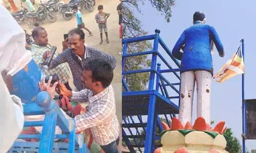 అంబేద్కర్ విగ్రహానికి అవమానం..