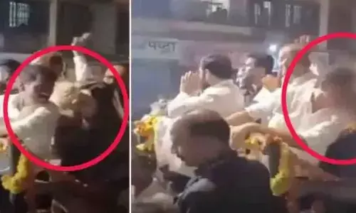 పబ్లిక్‌గా ఎమ్మెల్యే రాసలీలలు.. మహిళా నేతకు ముద్దులిస్తున్న వీడియో వైరల్