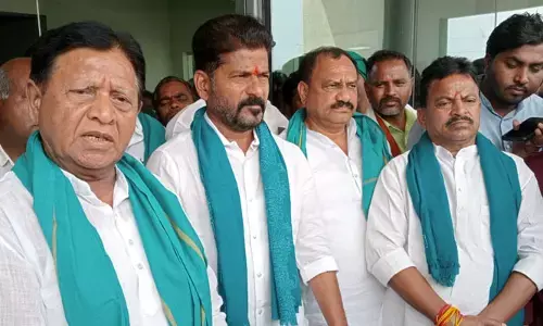 వాటాలివ్వాలని ఎమ్మెల్యే జీవన్ రెడ్డి బెదిరింపులు : రేవంత్ రెడ్డి