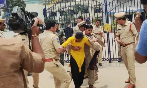 వివాదంలో నల్లగొండ సీఐ.. యువతి చెయ్యిపట్టి లాక్కెళ్లడంపై తీవ్ర విమర్శలు (వీడియో)