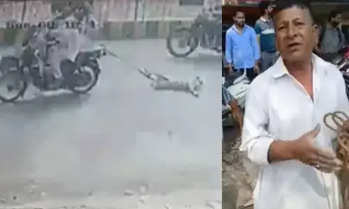 కుక్కను బైక్‌కు కట్టేసి 2 కి.మీ ఈడ్చుకెళ్లిన వ్యక్తి.. (వీడియో)