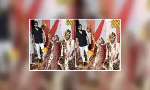 పెళ్లి వేడుకలో రివాల్వర్‌తో వధువు కాల్పులు (వీడియో)