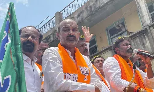 కర్ణాటకలో మళ్లీ బీజేపీదే అధికారం.. బీజేపీ అధికార ప్రతినిధి