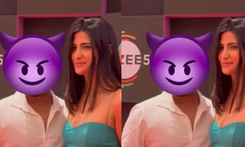 పబ్లిక్‌లోనే హీరోయిన్ నడుమును చుట్టేసిన అభిమాని..