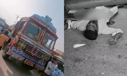 రోడ్డు క్రాస్ చేస్తుండగా బైక్‌ను ఢీకొట్టిన లారీ.. వ్యక్తి స్పాట్ డెడ్