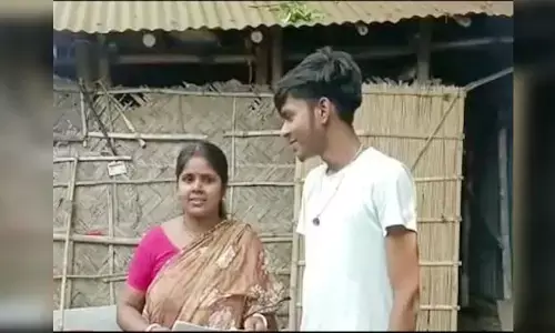 పరీక్షల్లో కొడుకు కంటే ఎక్కువ మార్కులు సాధించిన తల్లి..