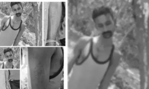 ఉరేసుకుని గుర్తు తెలియని వ్యక్తి మృతి