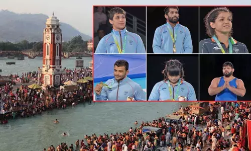 గంగా నదిలో పతకాలు వేయాలనుకున్న విషయంలో రెజ్లర్స్ కీలక నిర్ణయం