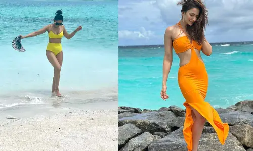 ఎల్లో మామిడి పండ్ల లా మెరిసిపోతు బీచ్ లో రకుల్