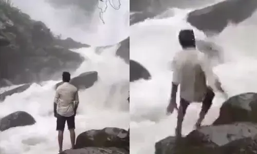 Viral Video : వీడియో కోసం వెళ్లి నీటిలో కొట్టుకుపోయాడు (వీడియో)