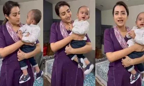 హీరోయిన్ త్రిష ఎత్తుకుని మరీ ఆడిస్తున్న ఈ బాబు ఎవరో తెలిస్తే షాక్ అవ్వాల్సిందే? క్యూట్ వీడియో వైరల్