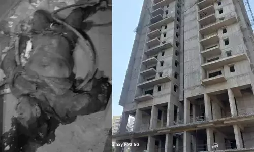 విషాదం.. భవనం పైనుంచి పడి కార్మికుడు మృతి
