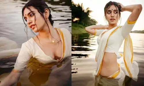 శారీలో తడిసిముద్దైన యంగ్ హీరోయిన్.. హాట్ కామెంట్లతో నెటిజన్ల రచ్చ!