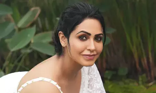 నీటిలో విచ్చుకున్న కలవ పువ్వులా.తడిసిన అందాలతో టెంప్ట్ చేస్తోన్న నందిని