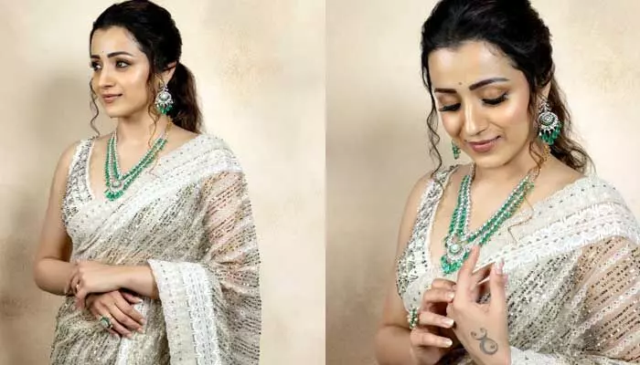 వైట్ శారీలో రచ్చ చేస్తున్న త్రిష..! వైట్ శారీలో రచ్చ చేస్తున్న త్రిష..!
