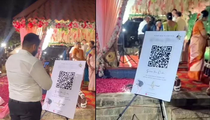 సోషల్ మీడియాకు కిక్ ఇచ్చిన పెళ్లి జంట.. ఏకంగా QR కోడ్ బోర్డు పెట్టి..!! సోషల్ మీడియాకు కిక్ ఇచ్చిన పెళ్లి జంట.. ఏకంగా QR కోడ్ బోర్డు పెట్టి..!!