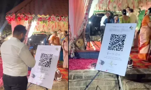 సోషల్ మీడియాకు కిక్ ఇచ్చిన పెళ్లి జంట.. ఏకంగా QR కోడ్ బోర్డు పెట్టి..!!