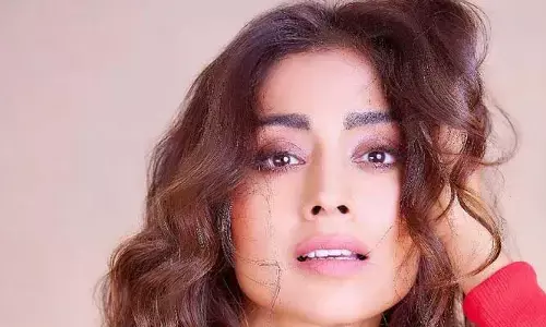 Shriya Saran hot looks in red