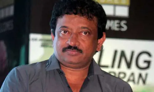 నారా లోకేష్‌కు ముద్దు పెట్టిన దర్శకుడు రామ్ గోపాల్ వర్మ