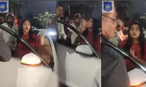 రాంగ్ రూట్‌లో వచ్చి.. మహిళ వీరంగం! ట్రాఫిక్ పోలీస్ బట్టలు చింపి హల్ చల్!