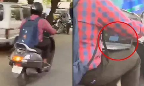 ఈ టెకీ యమా.. స్మార్ట్ గురూ! స్కూటీపై వెళుతూ.. లాప్‌టాప్‌లో క్లయింట్ కాల్ అటెండ్ (వీడియో వైరల్)