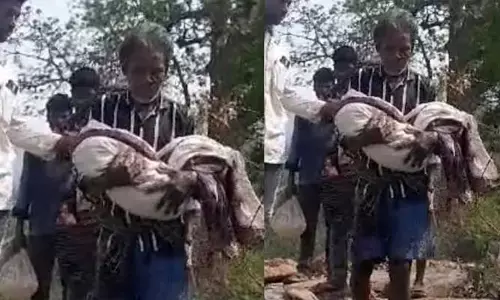బిడ్డ మృతదేహంతో ఎనిమిది కిలోమీటర్ల నడక