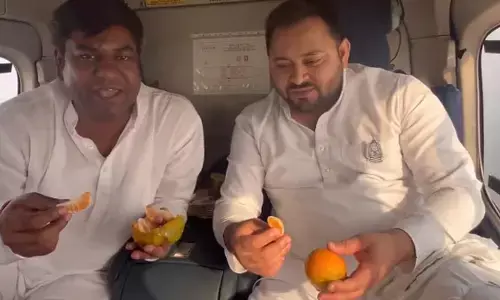 హలో ఫ్రెండ్స్.. హెలికాప్టర్‌లో ఆరెంజ్ పార్టీ.. తేజస్వీ యాదవ్ మరో వివాదం