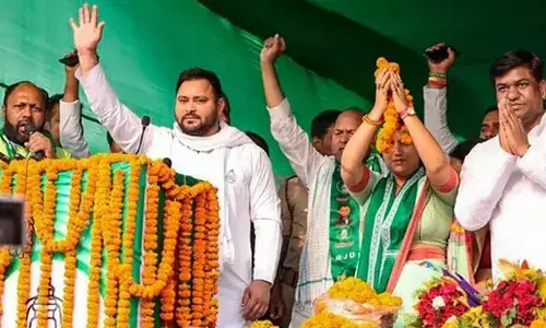 దేశ వ్యాప్తంగా కోటి ఉద్యోగాలు..బిహార్‌కు ప్రత్యేక హోదా: ఆర్జేడీ మేనిఫెస్టో రిలీజ్